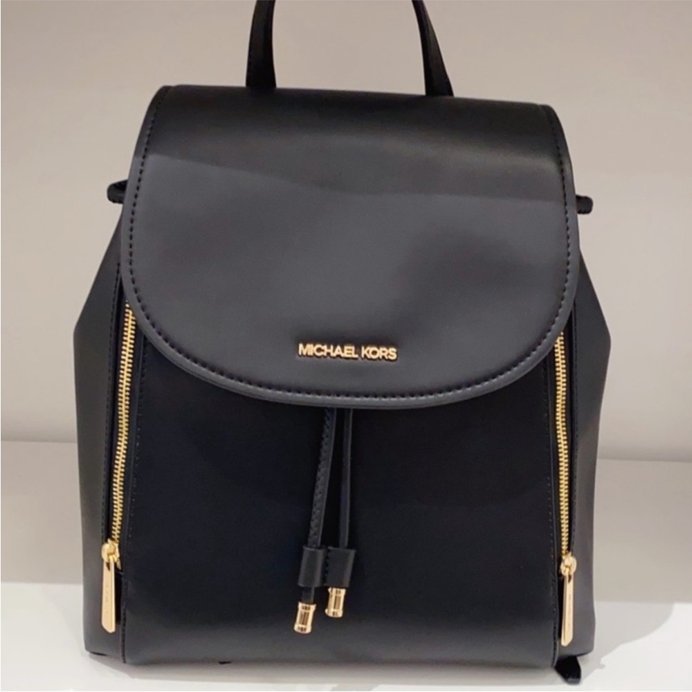 Michael Kors Black Leather
Backpack with Gold Hardware - Picture 3 of 14
